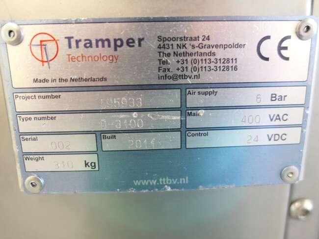 Tramper filling- and traysealing line