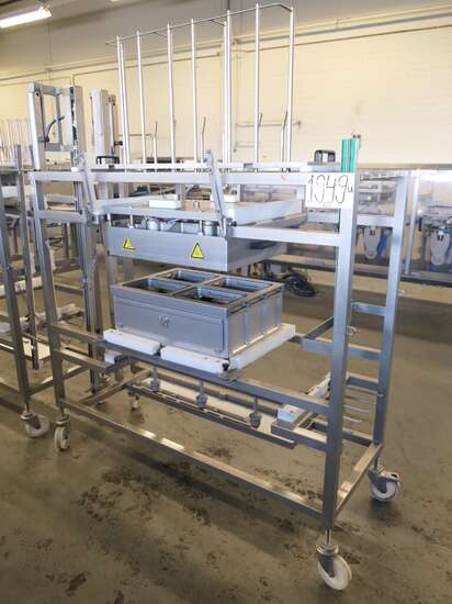 Tramper filling- and traysealing line