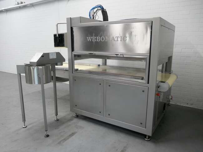 Webomatic belt vacuum machine